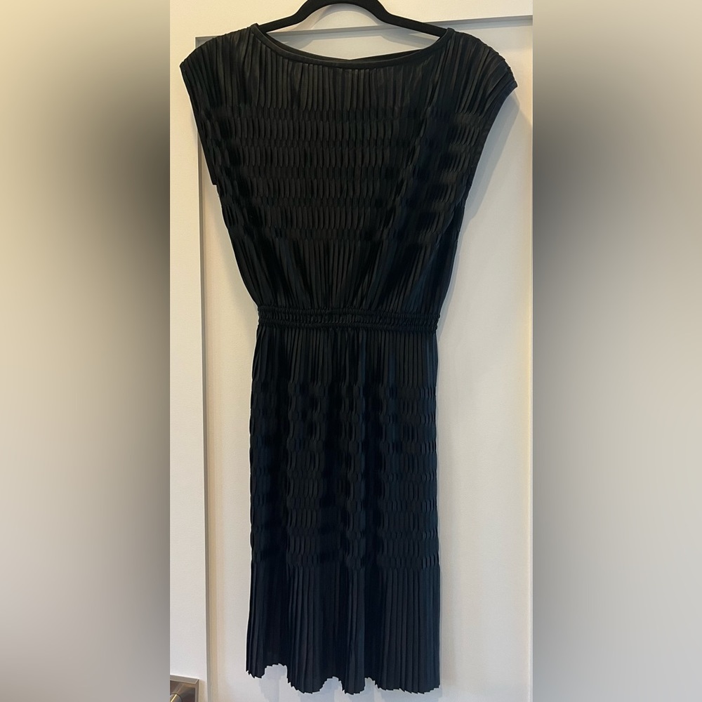 Black vintage polyester dress with stretch at waist.